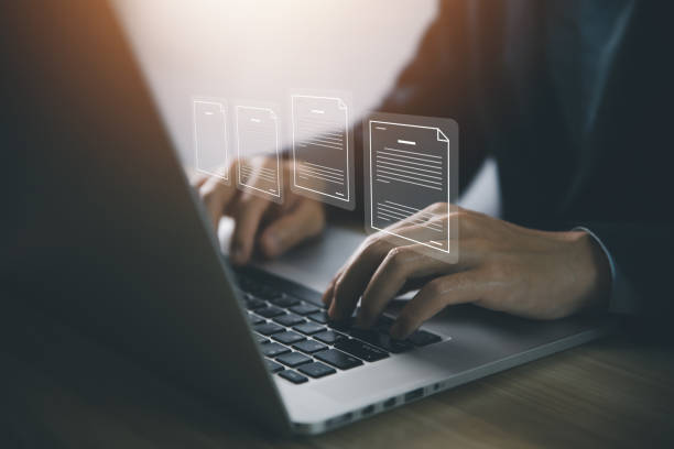 open laptop with person typing.